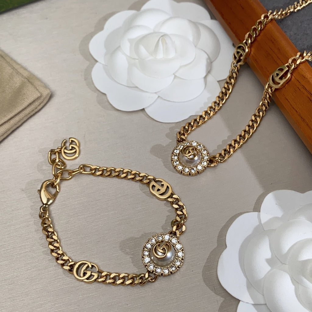 18K Gucci Double Interlocking Gucci Pearl Chain Bracelet