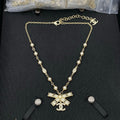 18K Chanel Bow Tie Diamond Gold Necklace