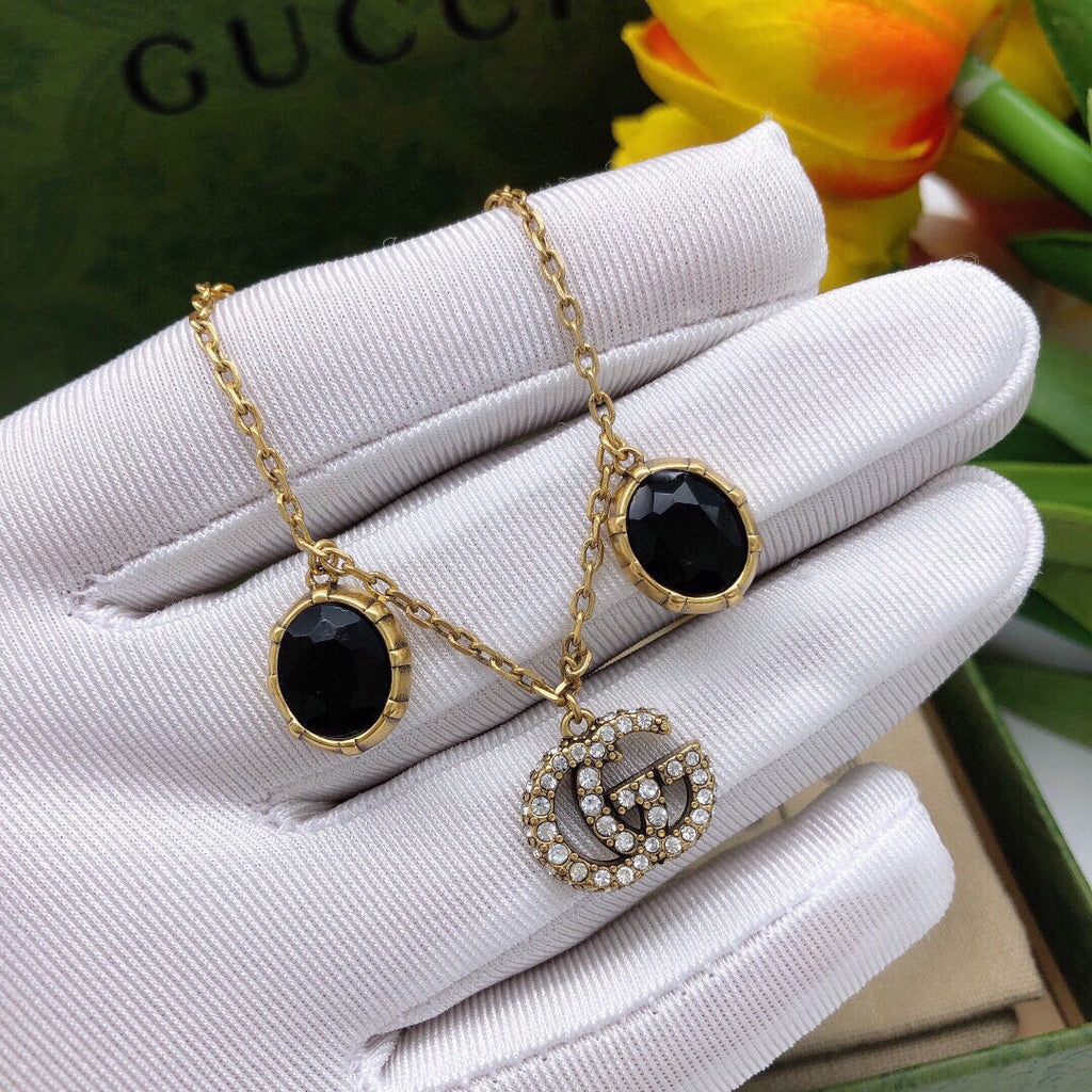 18K Gucci Double Black Stones Bracelet