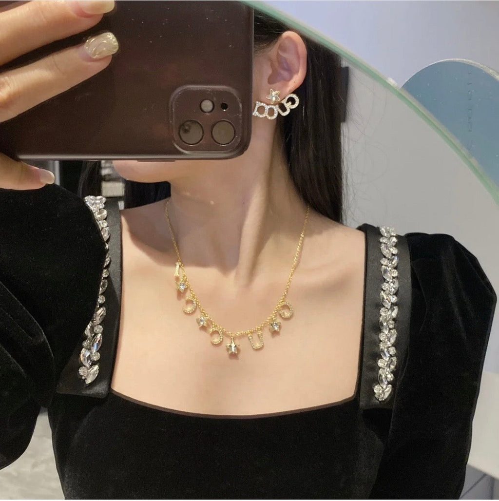 18K Gucci Double Script Star Earrings